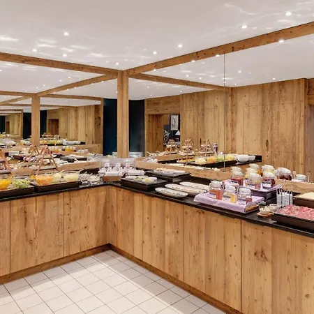 Отель Morosani Schweizerhof 4*